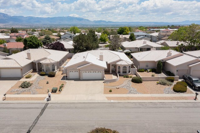 10320 Durham St NW, Albuquerque, NM 87114 - aerial perspective of suburban area with mountains