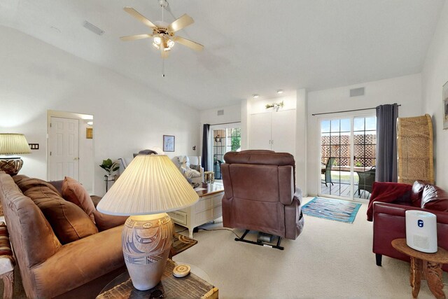 10320 Durham St NW, Albuquerque, NM 87114 - living room featuring vaulted ceiling, light carpet, a ceiling fan, and healthy amount of natural light