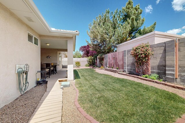 10320 Durham St NW, Albuquerque, NM 87114 - fenced backyard with a patio area