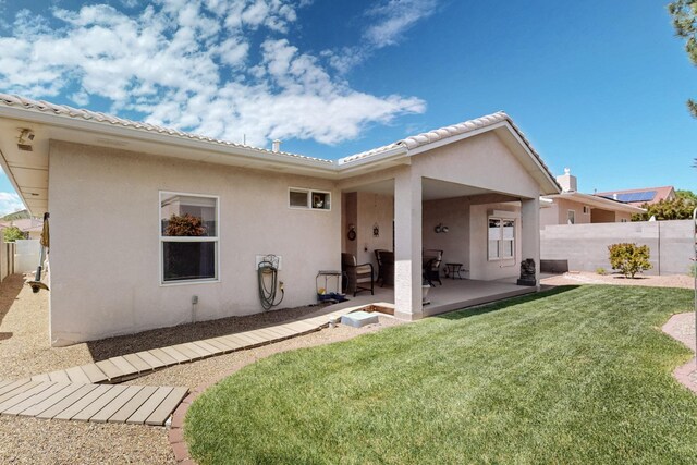 10320 Durham St NW, Albuquerque, NM 87114 - rear view of house featuring a patio and stucco siding