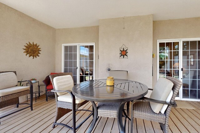 10320 Durham St NW, Albuquerque, NM 87114 - wooden deck featuring outdoor dining space