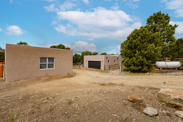 13 Asher Ln, Tijeras, NM 87059 - view of yard featuring fence and a detached garage