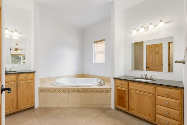 13 Asher Ln, Tijeras, NM 87059 - bathroom with tile patterned flooring, a bath, and two vanities