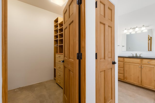 13 Asher Ln, Tijeras, NM 87059 - hallway featuring a sink and finished concrete flooring