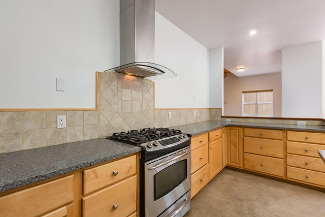 13 Asher Ln, Tijeras, NM 87059 - kitchen featuring exhaust hood, gas stove, tasteful backsplash, dark stone counters, and light brown cabinetry