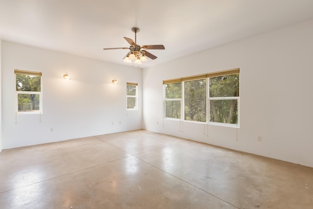 13 Asher Ln, Tijeras, NM 87059 - empty room featuring finished concrete flooring and a ceiling fan