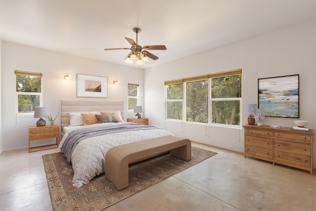 13 Asher Ln, Tijeras, NM 87059 - bedroom featuring finished concrete floors and a ceiling fan