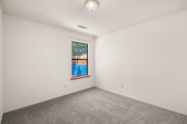 1905 Gomez Dr SW, Los Lunas, NM 87031 - empty room featuring carpet flooring and baseboards