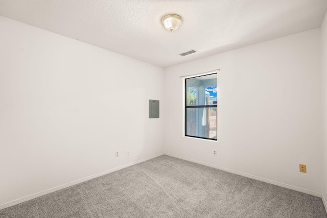 1905 Gomez Dr SW, Los Lunas, NM 87031 - carpeted empty room featuring baseboards and electric panel