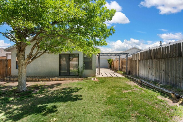 1905 Gomez Dr SW, Los Lunas, NM 87031 - view of yard featuring a patio area and a pergola