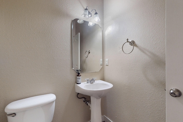 1723 Avenida Real, Albuquerque, NM 87105 - bathroom featuring toilet and a sink