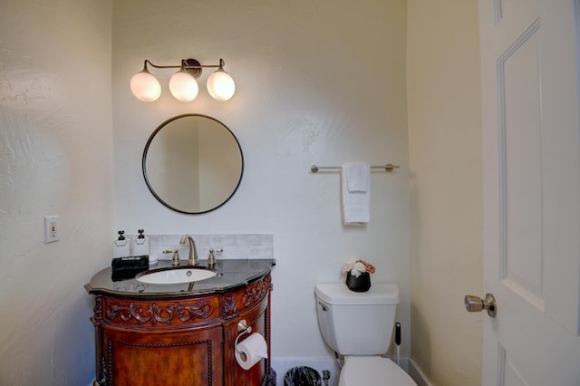 223 14th St NW, Albuquerque, NM 87104 - bathroom with vanity and toilet