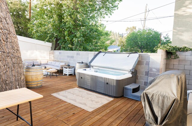 223 14th St NW, Albuquerque, NM 87104 - deck with a hot tub, an outdoor living space, and area for grilling