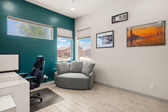 1661 Camino Culiacan, Los Lunas, NM 87031 - office area featuring wood finished floors, baseboards, a textured wall, and recessed lighting