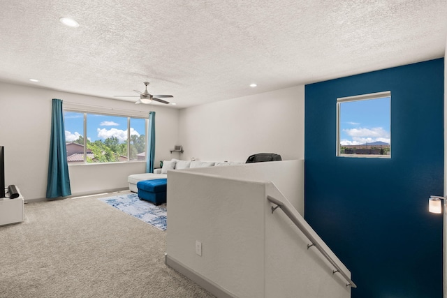 1661 Camino Culiacan, Los Lunas, NM 87031 - unfurnished bedroom featuring carpet floors, a textured ceiling, recessed lighting, a ceiling fan, and baseboards