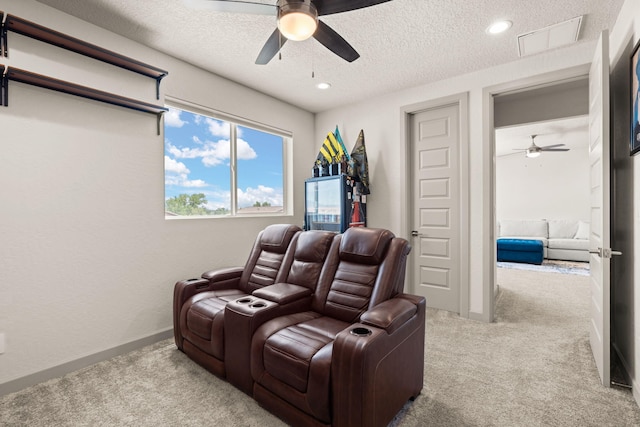 1661 Camino Culiacan, Los Lunas, NM 87031 - cinema featuring a ceiling fan, carpet flooring, a textured ceiling, and recessed lighting