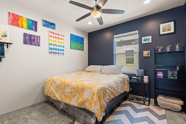1661 Camino Culiacan, Los Lunas, NM 87031 - bedroom with carpet flooring, a textured ceiling, recessed lighting, a ceiling fan, and baseboards