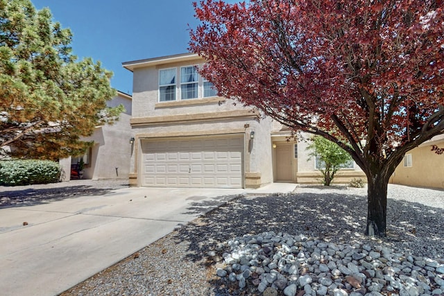 525 Peaceful Meadows Dr NE, Rio Rancho, NM 87144 - obstructed view of property featuring stucco siding, a garage, and concrete driveway