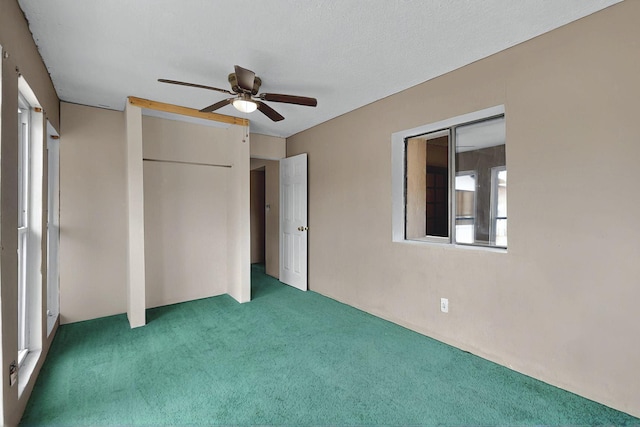 1237 Gabaldon Rd, Belen, NM 87002 - unfurnished bedroom with light colored carpet and a ceiling fan