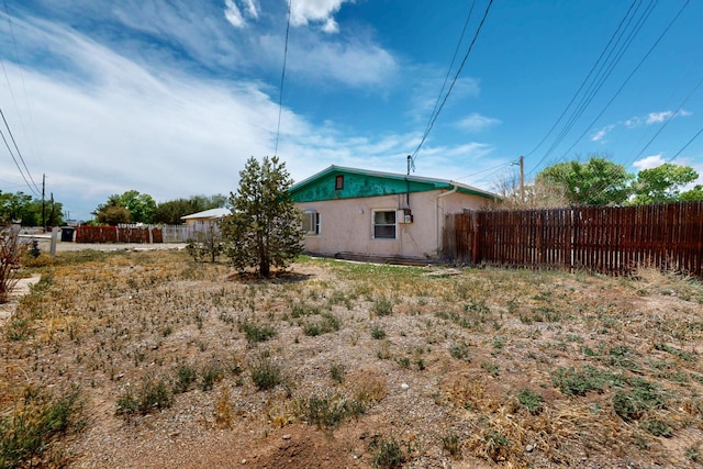 1237 Gabaldon Rd, Belen, NM 87002 - back of property with stucco siding