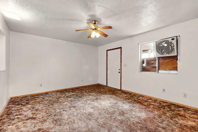 1237 Gabaldon Rd, Belen, NM 87002 - empty room with carpet flooring, ceiling fan, a textured ceiling, and baseboards