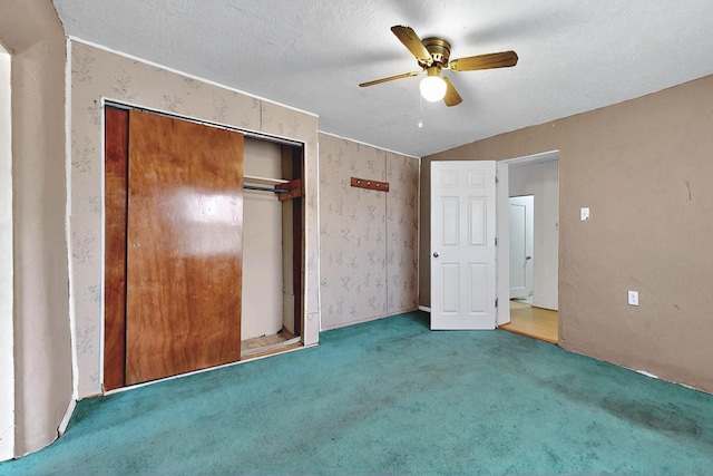 1237 Gabaldon Rd, Belen, NM 87002 - unfurnished bedroom featuring carpet, a closet, ceiling fan, and a textured ceiling