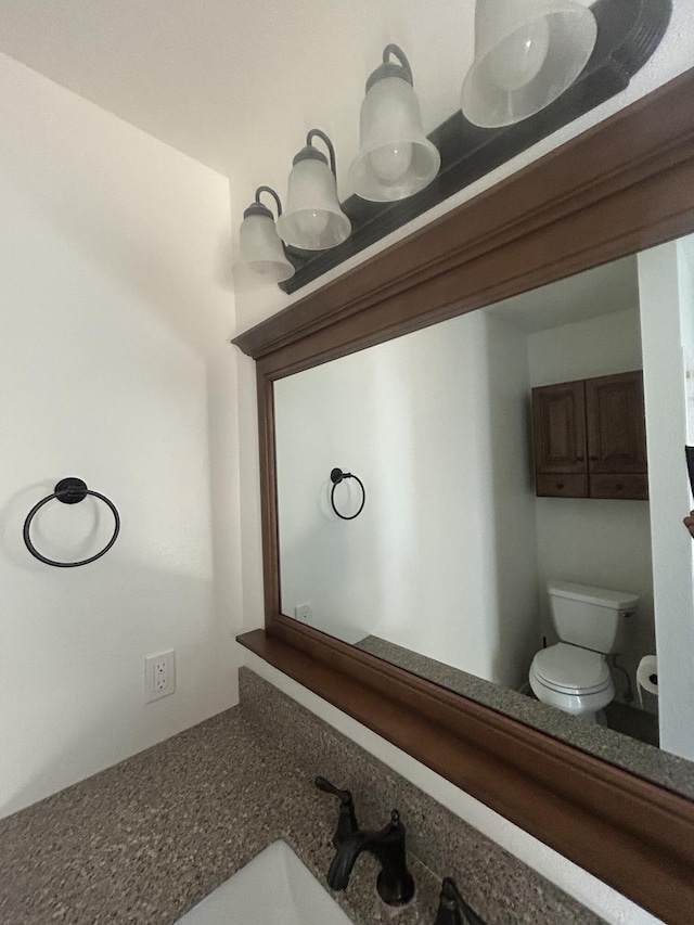 2833 Tiffany Rd, Tucumcari, NM 88401 - bathroom featuring toilet and vanity