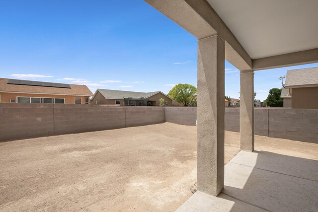 6 Margarita Cir, Los Lunas, NM 87031 - fenced backyard featuring a patio area