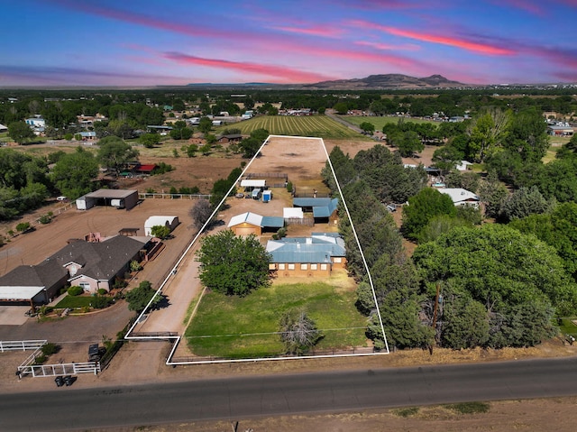 84 Fire Station Rd, Los Lunas, NM 87031 - aerial overview of property's location featuring property boundaries highlighted and a mountainous background