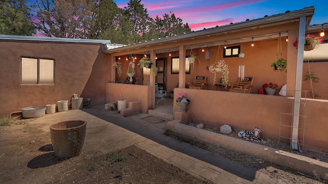 84 Fire Station Rd, Los Lunas, NM 87031 - rear view of property featuring stucco siding