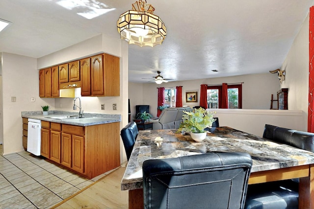 8224 Bret Pl NE, Albuquerque, NM 87109 - dining room featuring ceiling fan and light wood finished floors