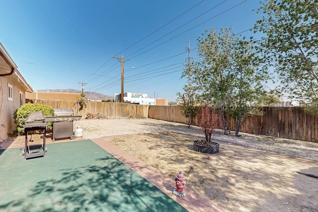 8224 Bret Pl NE, Albuquerque, NM 87109 - fenced backyard featuring a patio
