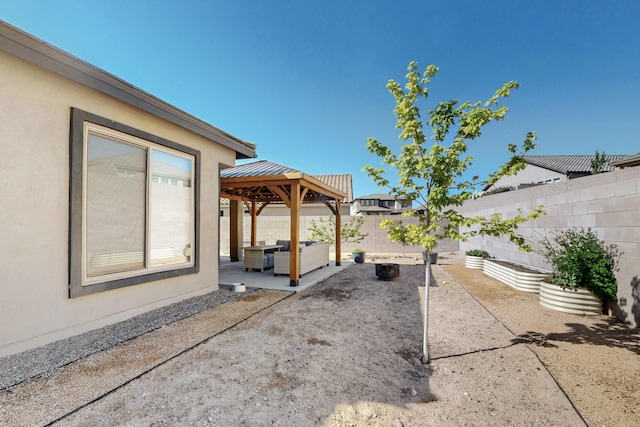1605 Copper Mountain Trl NW, Albuquerque, NM 87120 - fenced backyard featuring a patio area, a gazebo, and an outdoor hangout area