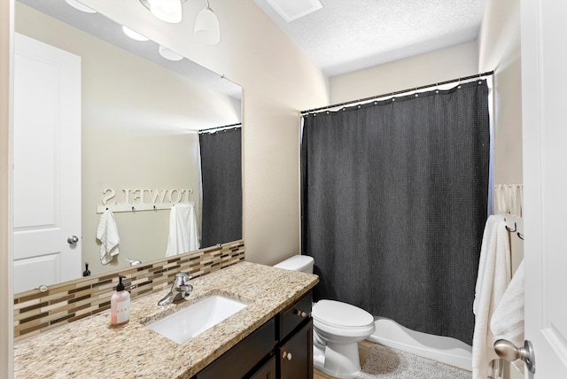 2659 Vista Manzano Loop NE, Rio Rancho, NM 87144 - bathroom featuring vanity, toilet, backsplash, a textured ceiling, and a shower with curtain
