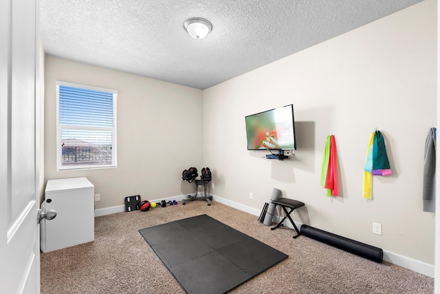 2659 Vista Manzano Loop NE, Rio Rancho, NM 87144 - exercise area featuring carpet, a textured ceiling, and baseboards