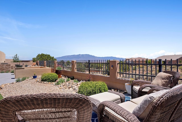 2659 Vista Manzano Loop NE, Rio Rancho, NM 87144 - view of patio / terrace with an outdoor living space and a mountain view