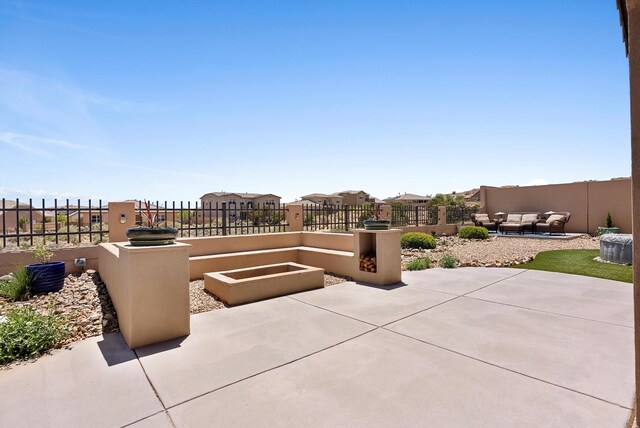 2659 Vista Manzano Loop NE, Rio Rancho, NM 87144 - view of patio / terrace with an outdoor hangout area