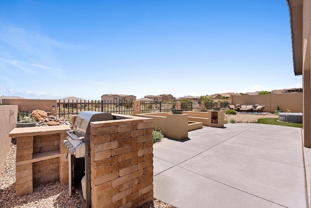 2659 Vista Manzano Loop NE, Rio Rancho, NM 87144 - fenced backyard featuring a patio, area for grilling, and a residential view