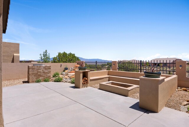 2659 Vista Manzano Loop NE, Rio Rancho, NM 87144 - view of patio with a mountain view
