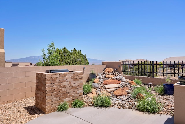 2659 Vista Manzano Loop NE, Rio Rancho, NM 87144 - view of patio featuring a mountain view