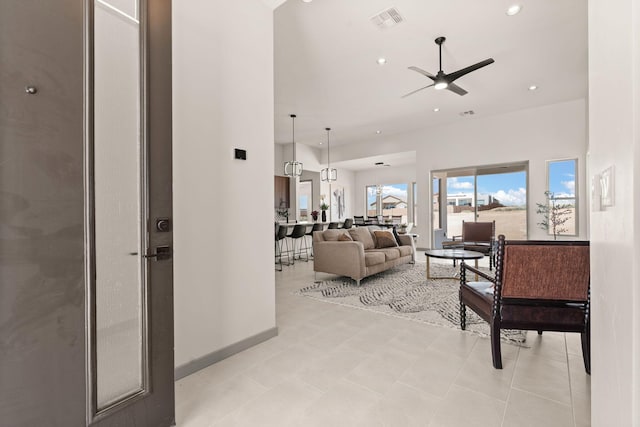 1413 6th St SE, Rio Rancho, NM 87124 - living room with a ceiling fan, recessed lighting, and baseboards