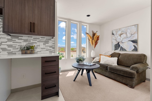 1413 6th St SE, Rio Rancho, NM 87124 - living room featuring plenty of natural light and baseboards