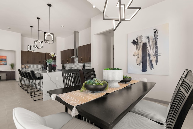 1413 6th St SE, Rio Rancho, NM 87124 - dining room with light tile patterned floors and recessed lighting