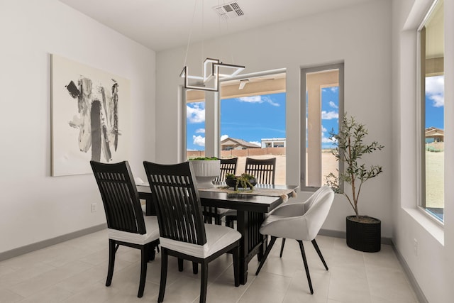 1413 6th St SE, Rio Rancho, NM 87124 - dining room featuring baseboards
