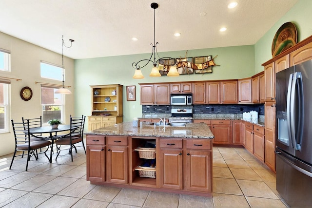 6500 Moon Shadows Dr NW, Albuquerque, NM 87120 - kitchen with stainless steel appliances, open shelves, tasteful backsplash, light stone countertops, and recessed lighting