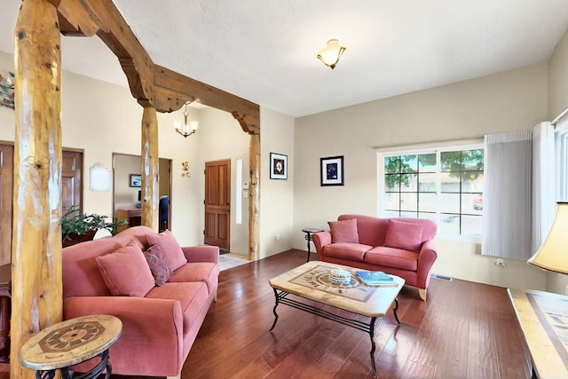 6500 Moon Shadows Dr NW, Albuquerque, NM 87120 - living room featuring a chandelier and wood finished floors