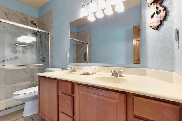 6500 Moon Shadows Dr NW, Albuquerque, NM 87120 - bathroom with toilet, a marble finish shower, double vanity, and tile patterned floors