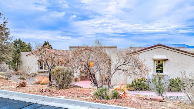 4110 Waterwillow Pl NW, Albuquerque, NM 87120 - mediterranean / spanish-style house with stucco siding and a tiled roof