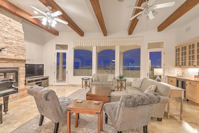 4110 Waterwillow Pl NW, Albuquerque, NM 87120 - living room featuring a ceiling fan, wine cooler, beamed ceiling, and bar area