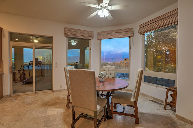 4110 Waterwillow Pl NW, Albuquerque, NM 87120 - dining room with a ceiling fan and baseboards